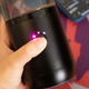 To dispense flavor, you just have to press the front button. You can also do it via the app.